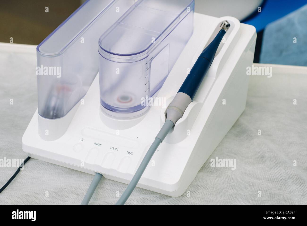Ultrasonic scaler in the dental office. Dentistry Concept Stock Photo