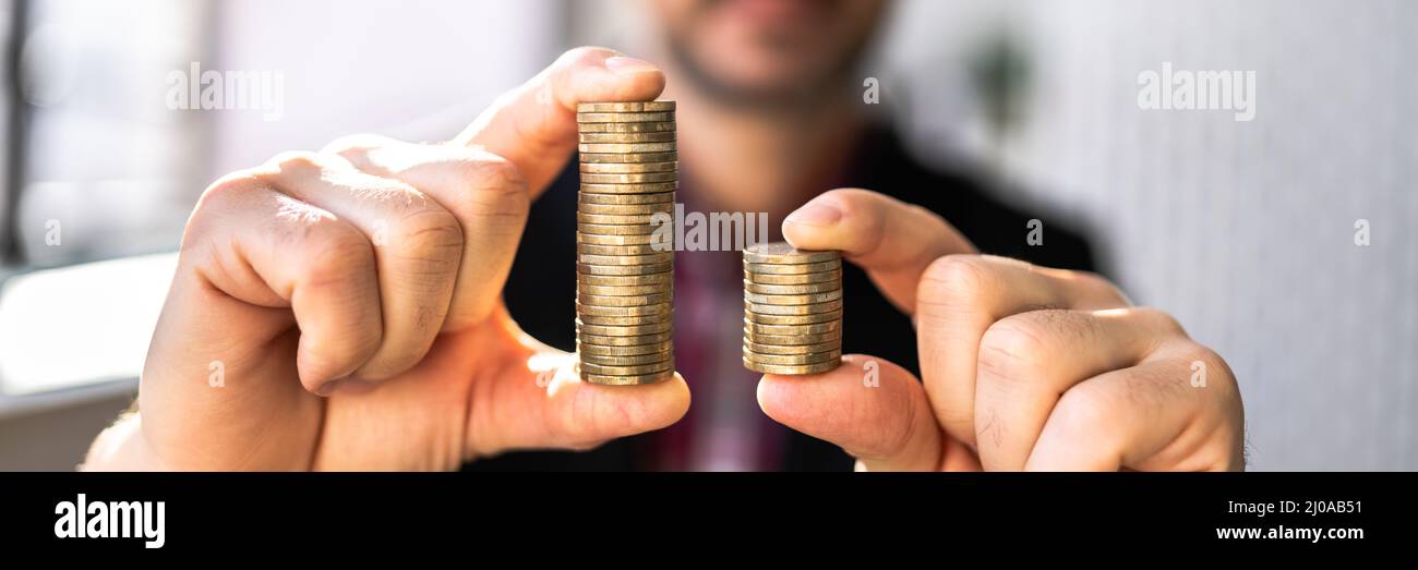 Compare Wage And Money Gap. Equal Pay Stock Photo