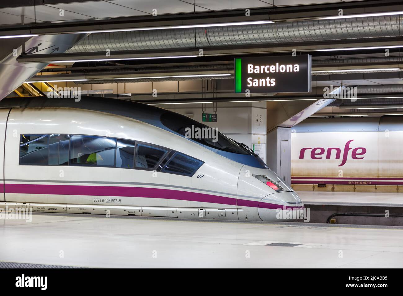 Barcelona, Spain - February 19, 2022: AVE Siemens Velaro high-speed train operated by RENFE rail at Barcelona Sants railway station in Barcelona, Spai Stock Photo