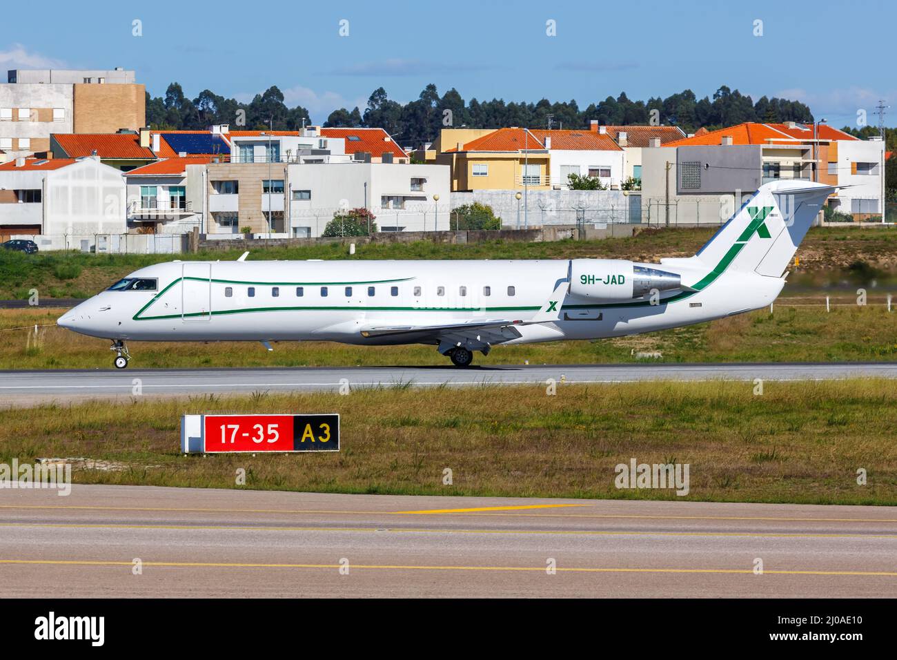 Porto, Portugal - September 21, 2021: Air X Charter Bombardier Challenger 850 airplane at Porto airport (OPO) in Portugal. Stock Photo