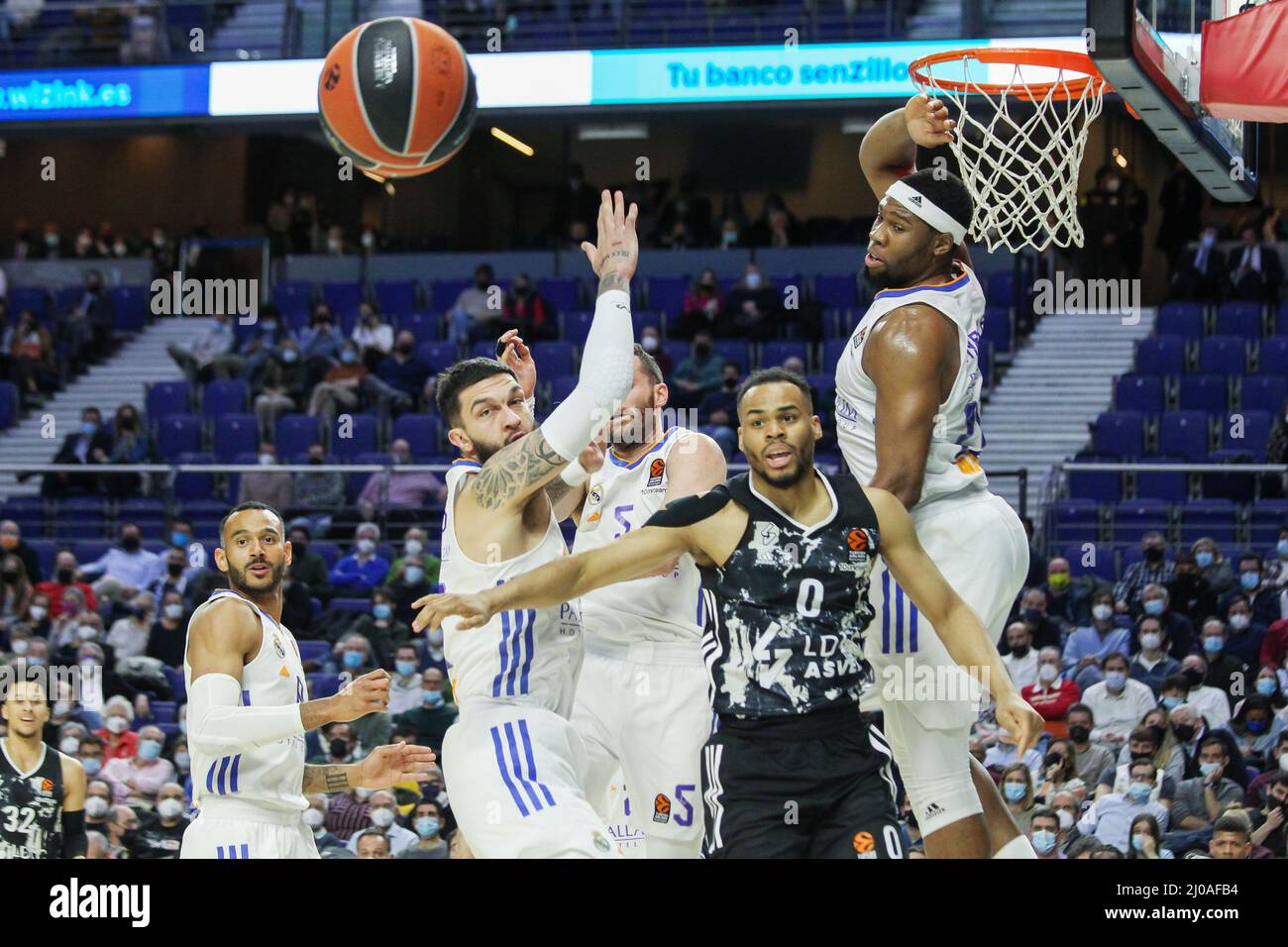 Madrid, Spain. 17th Mar, 2022. Vincent Poirier of Real Madrid, Elie Okobo of Asvel Lyon-Villeurbanne and Guerschon Yabusele of Real Madrid during the Turkish Airlines Euroleague basketball match between Real Madrid and Asvel Lyon-Villeurbanne on march 17, 2022 at Wizink Center in Madrid, Spain Credit: Independent Photo Agency/Alamy Live Newss Stock Photo