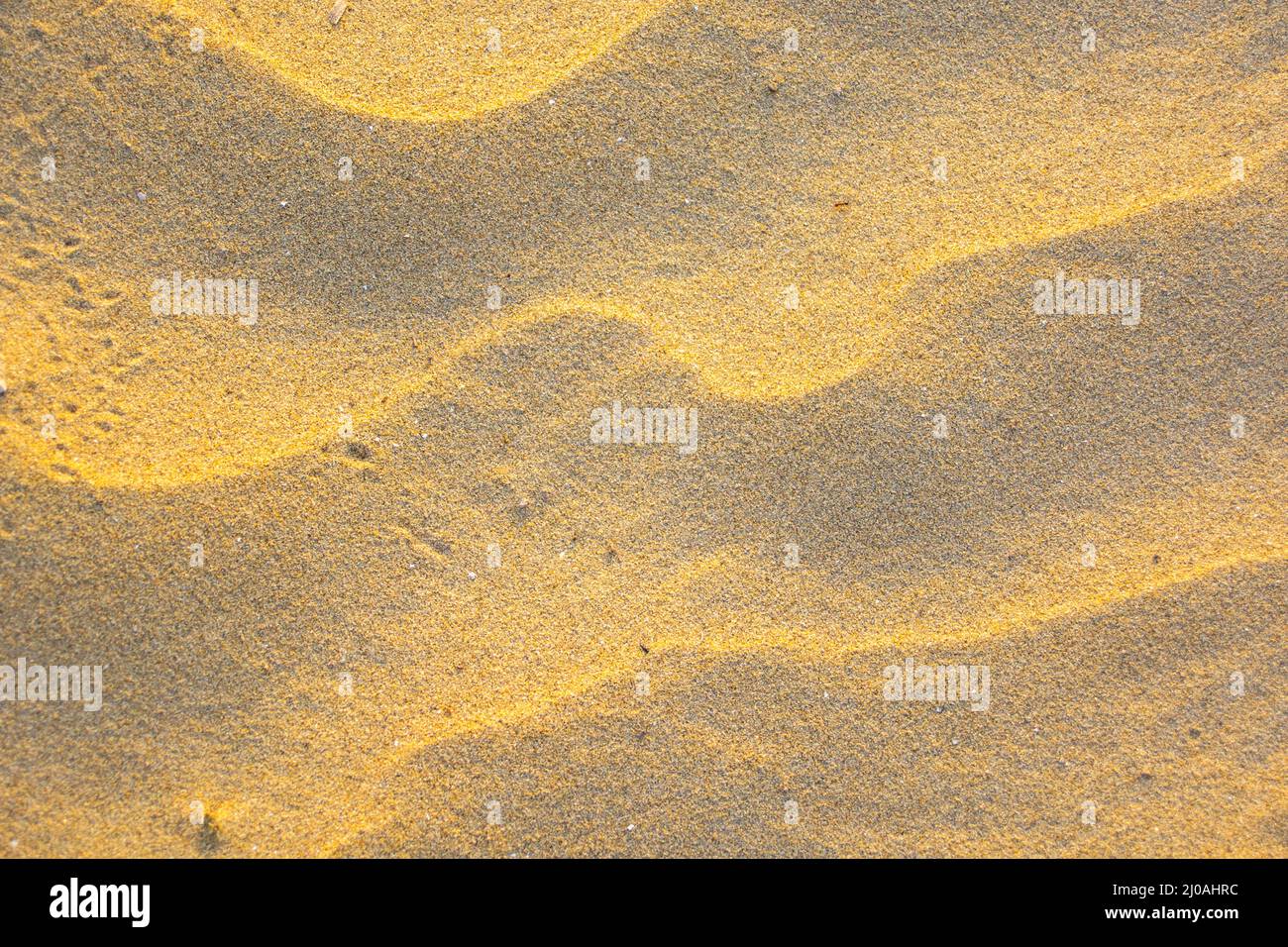 Wavy rippled pattern of sand Stock Photo