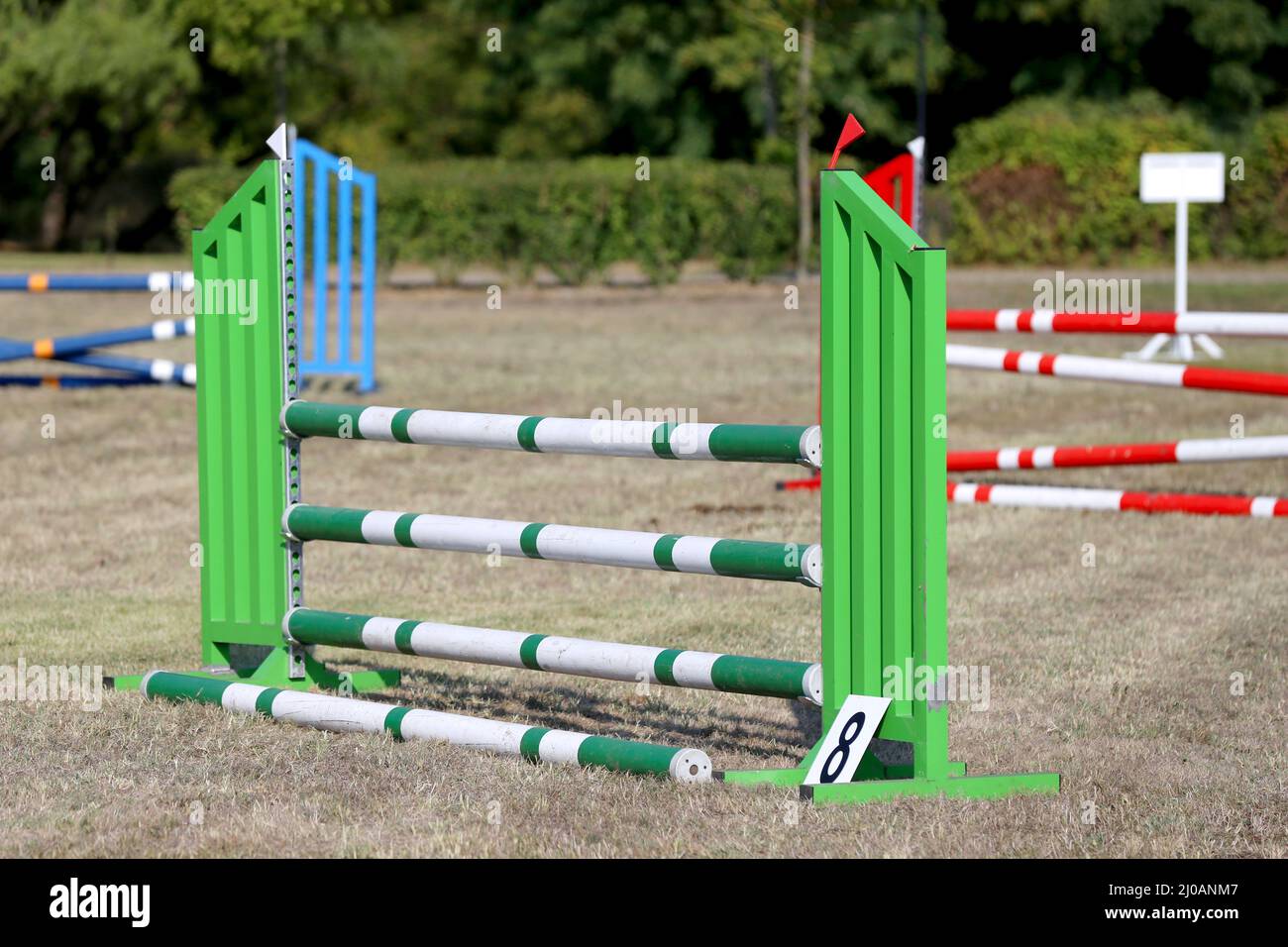 Show jumping poles obstacles, barriers, waiting for riders on show