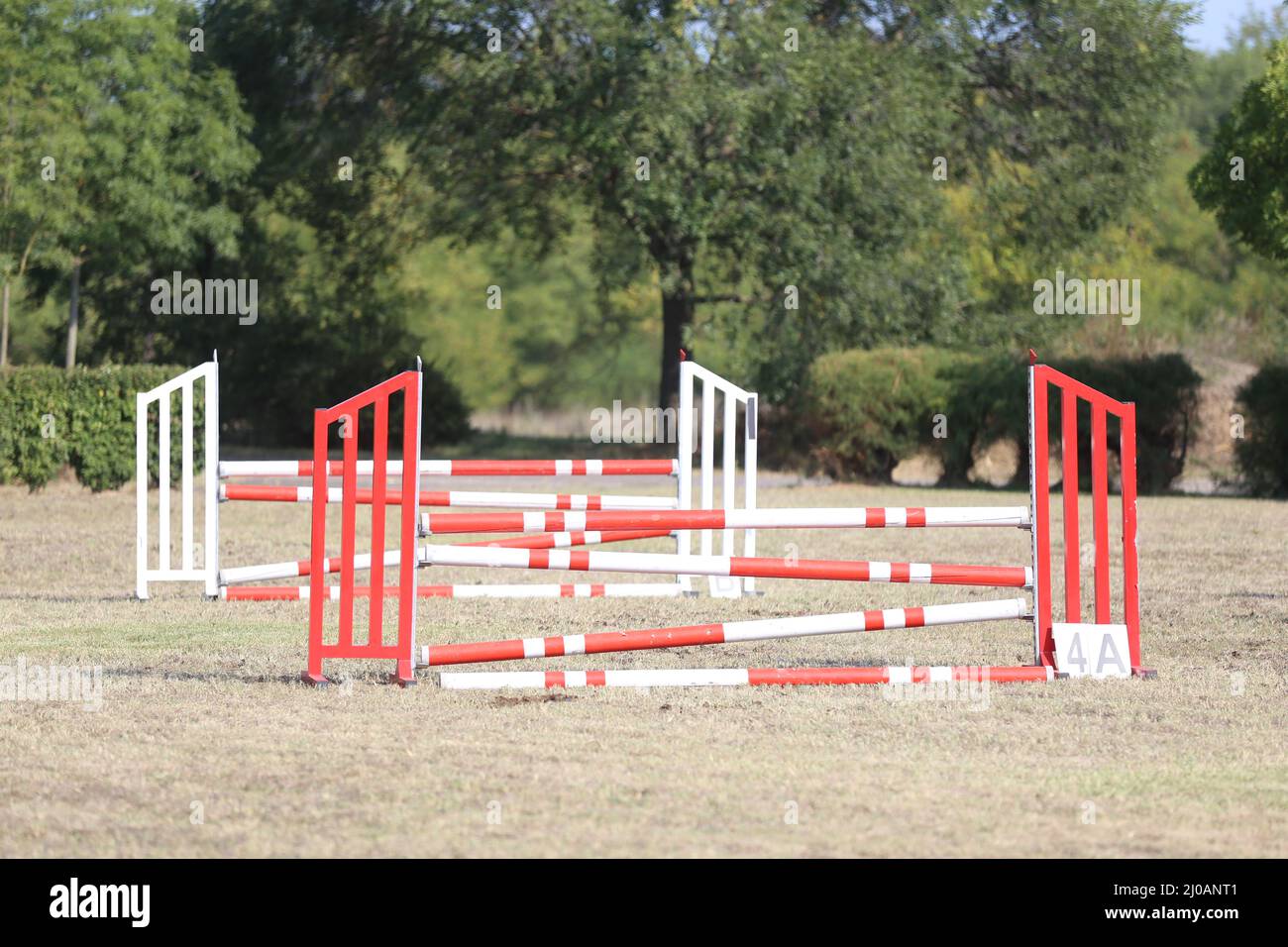 Show jumping poles obstacles, barriers, waiting for riders on show