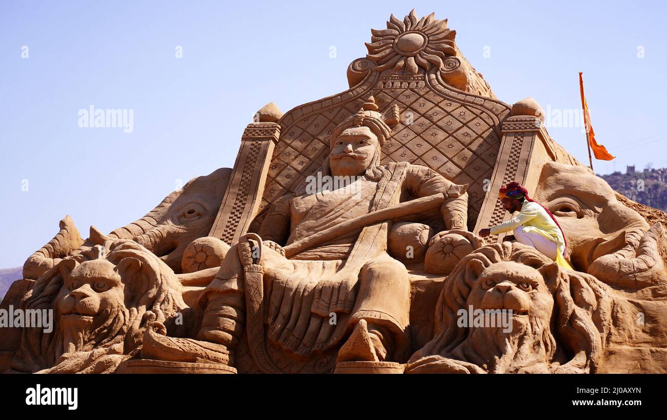 Indian Sand artist Ajay Rawat creates a sand art on Maharana Pratap to