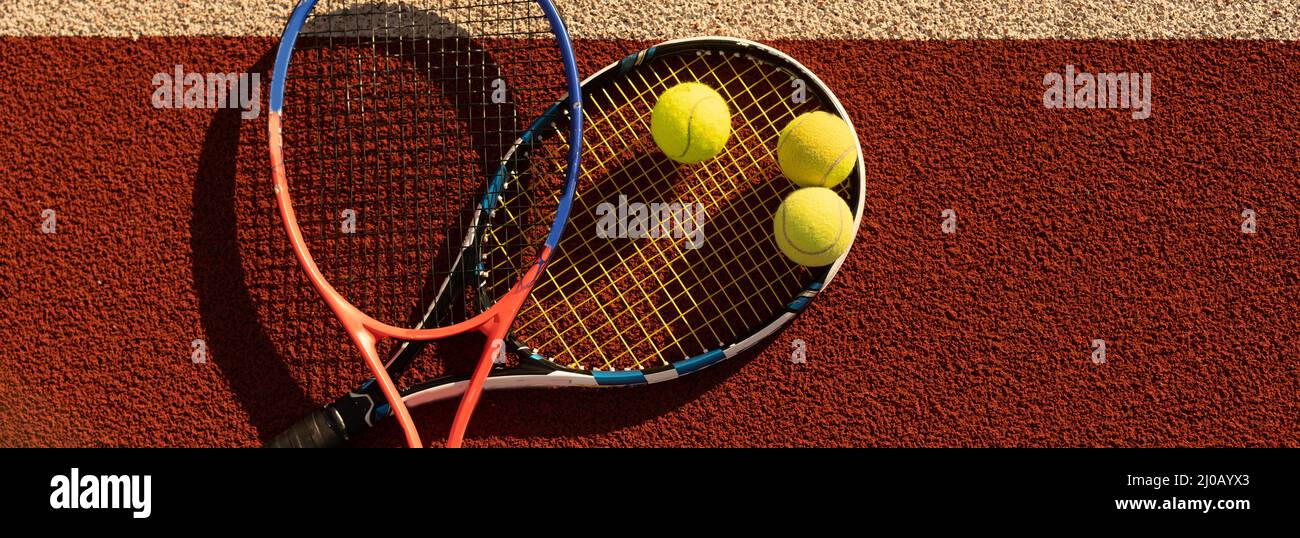 Tennis Ball with Racket on the racket in tennis court Stock Photo Alamy