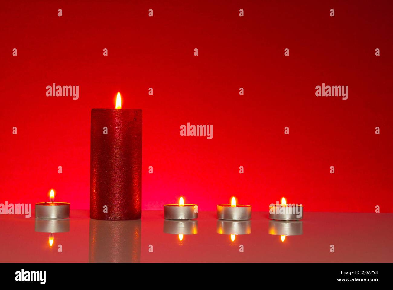 Five burning candles Stock Photo Alamy