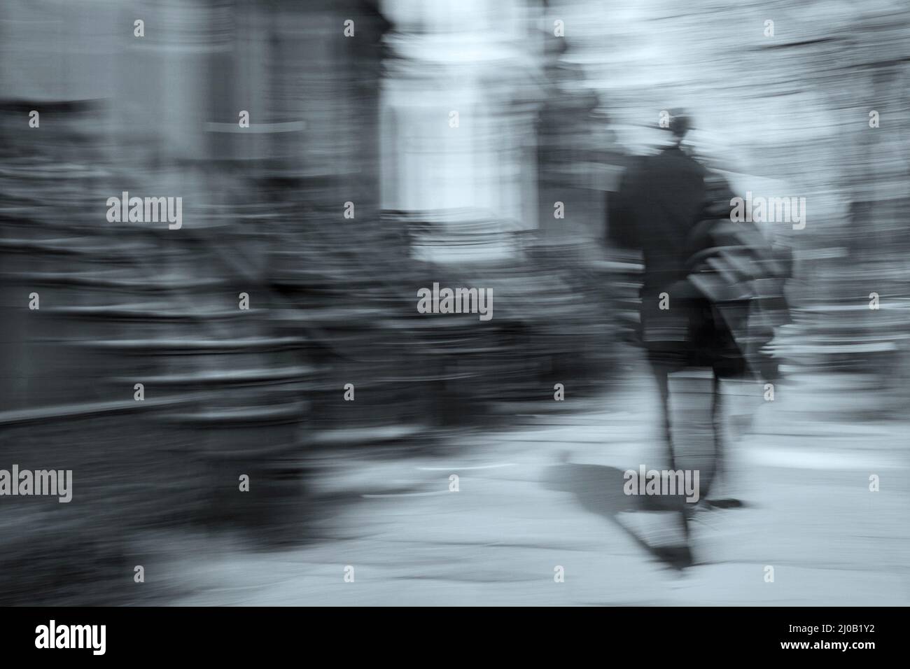 Man walking motion blur Stock Photo Alamy