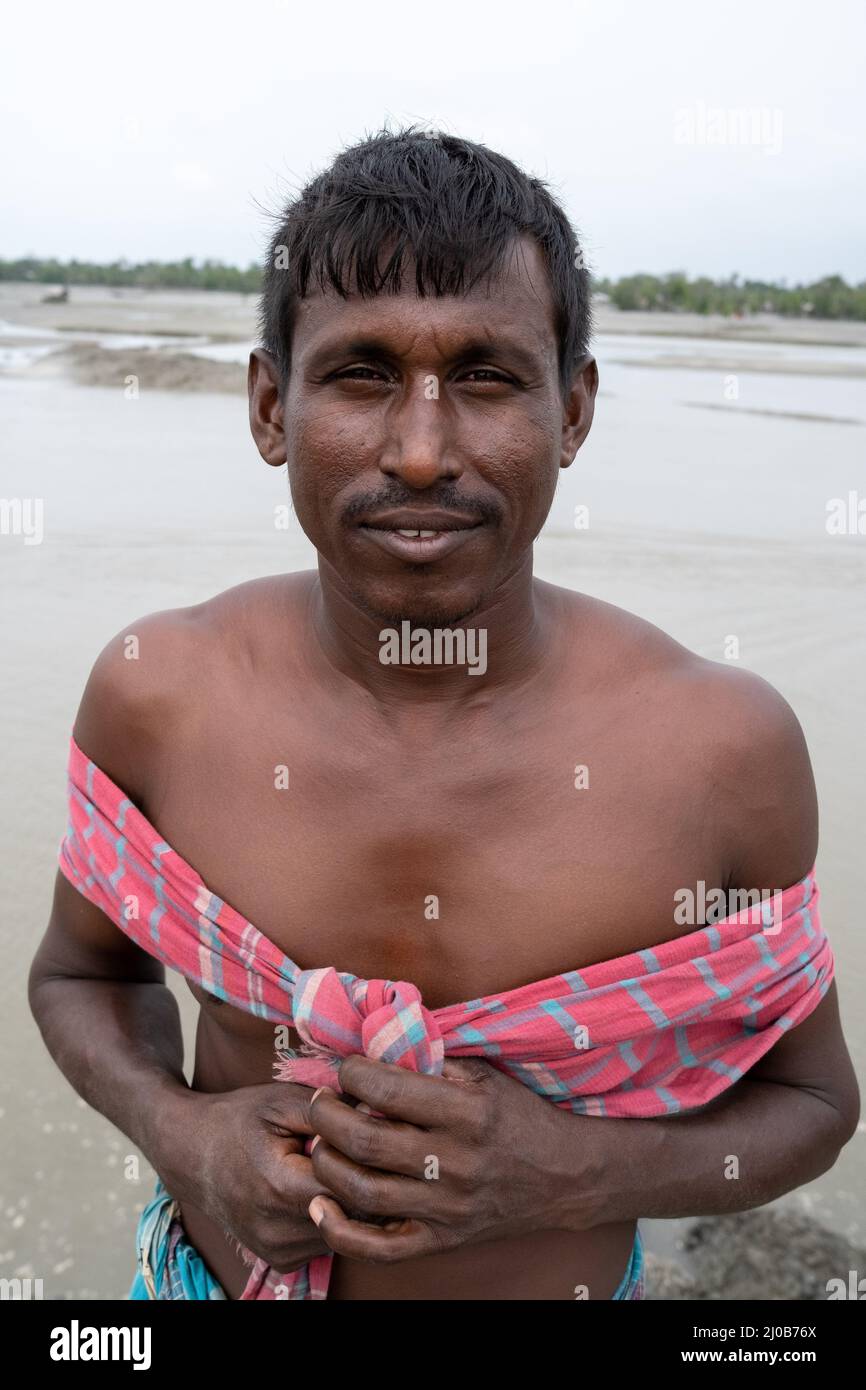 The Pratab Nagar village is severely affected by climate change, including rising water levels, erosion and salinisation. Satkhira Province, Bangladesh. Stock Photo