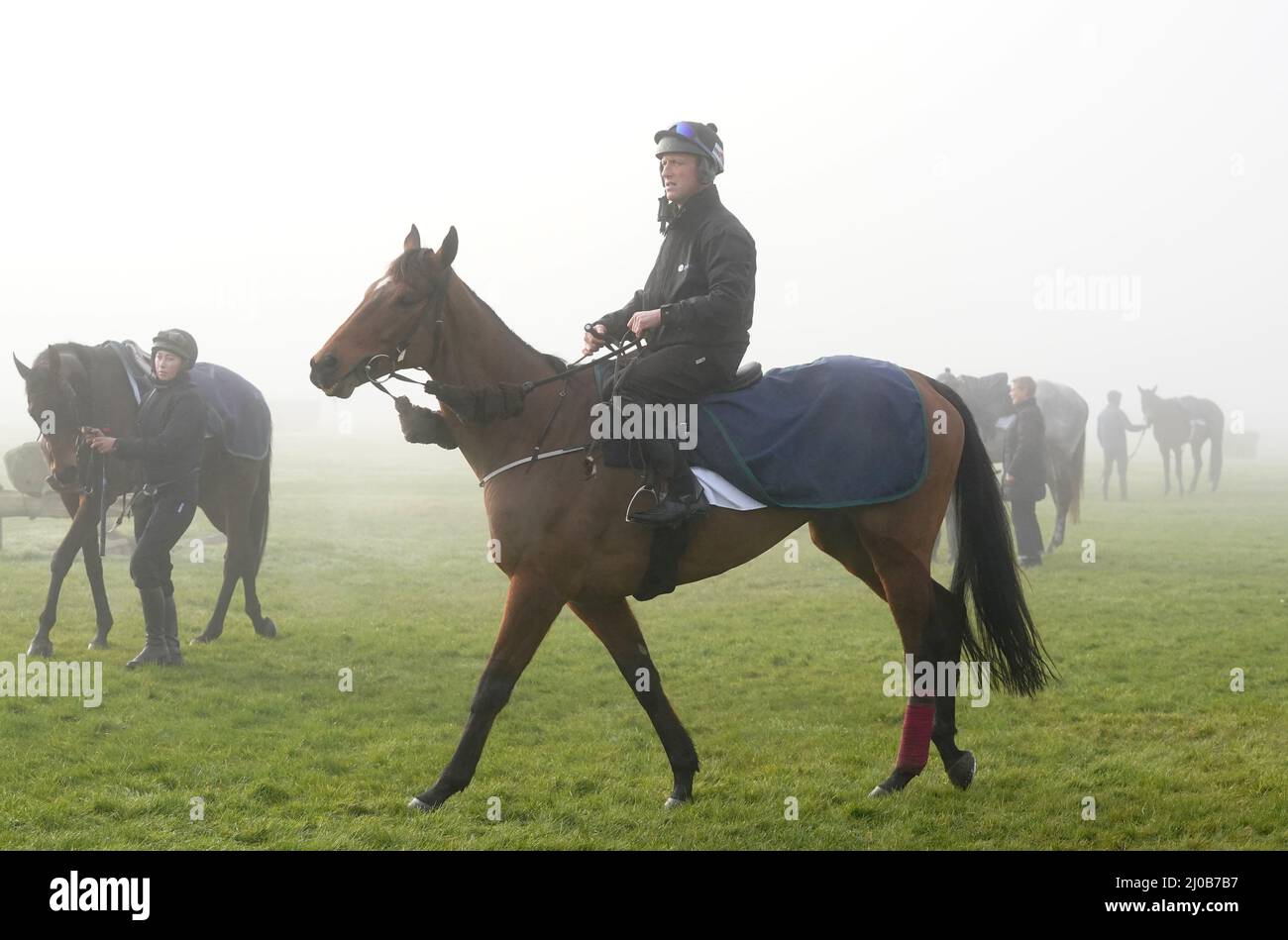 Robbie Power on Minella Indo on the gallops during day four of the Cheltenham Festival at Cheltenham Racecourse. Picture date: Friday March 18, 2022. Stock Photo