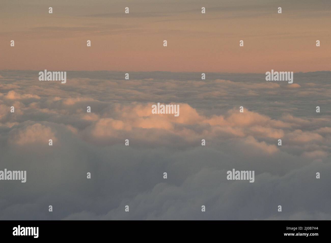Sky with clouds in blue and pink sunset evening colors Stock Photo - Alamy