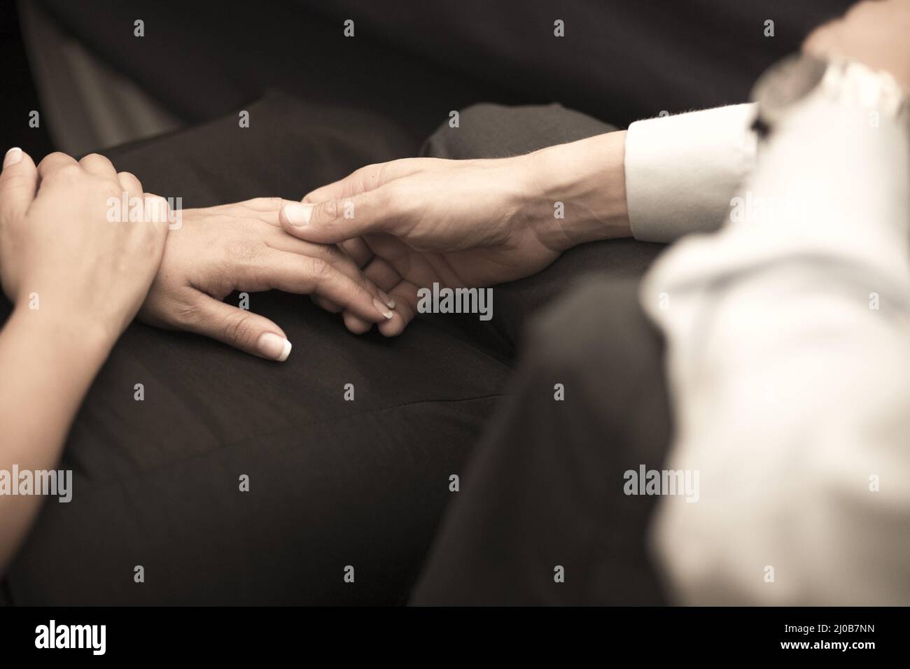 Man and woman holding hands in wedding banquet marriage party Stock Photo