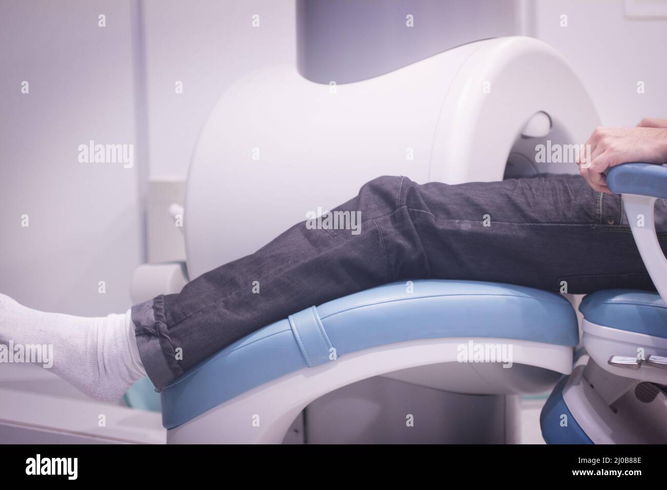 Patient and Doctor in fully open MRI CAT Scan Stock Photo