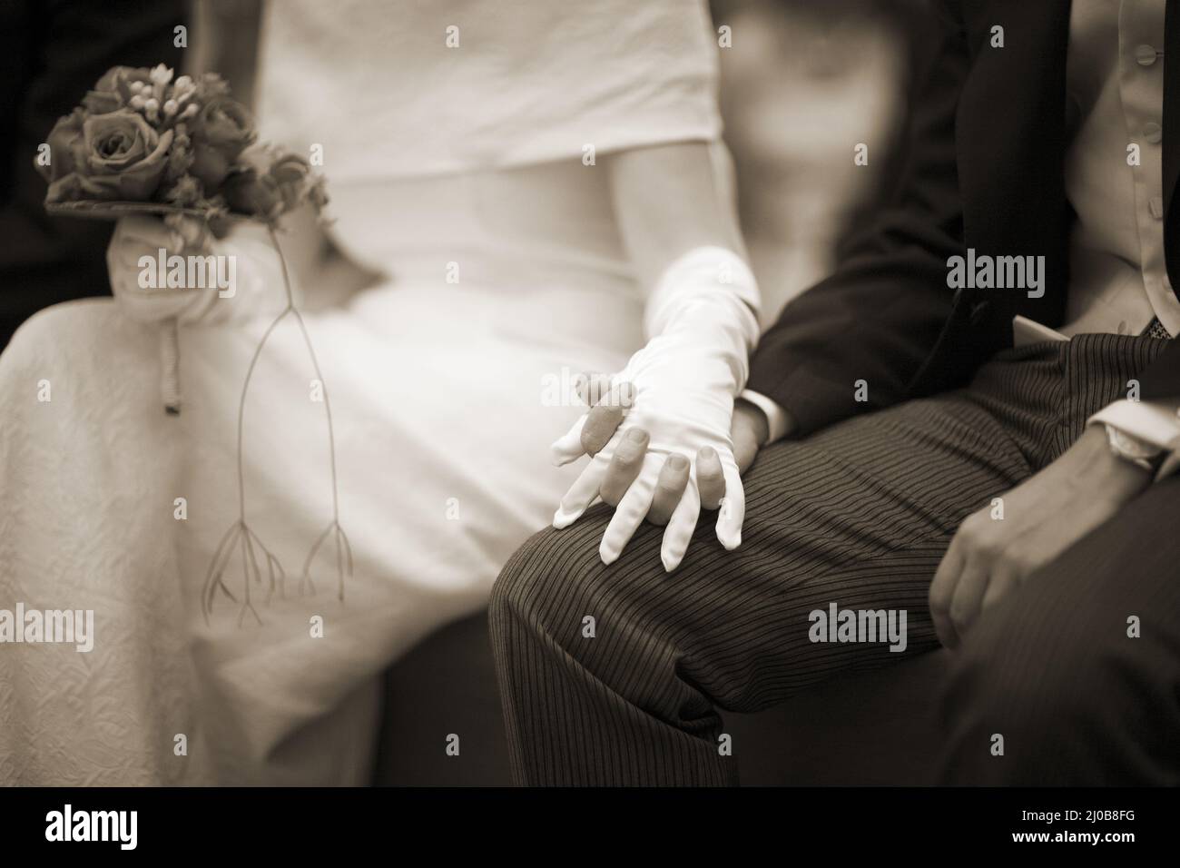 Hands of bride and bridegroom in wedding marriage ceremony Stock Photo