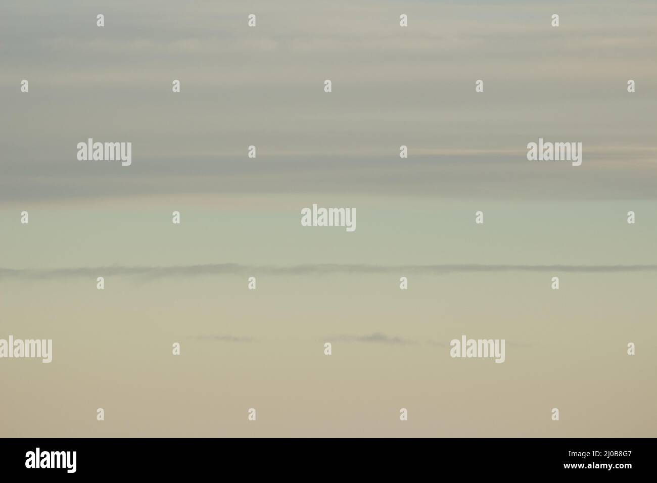 Blue sky with clouds seen from plane window Stock Photo - Alamy
