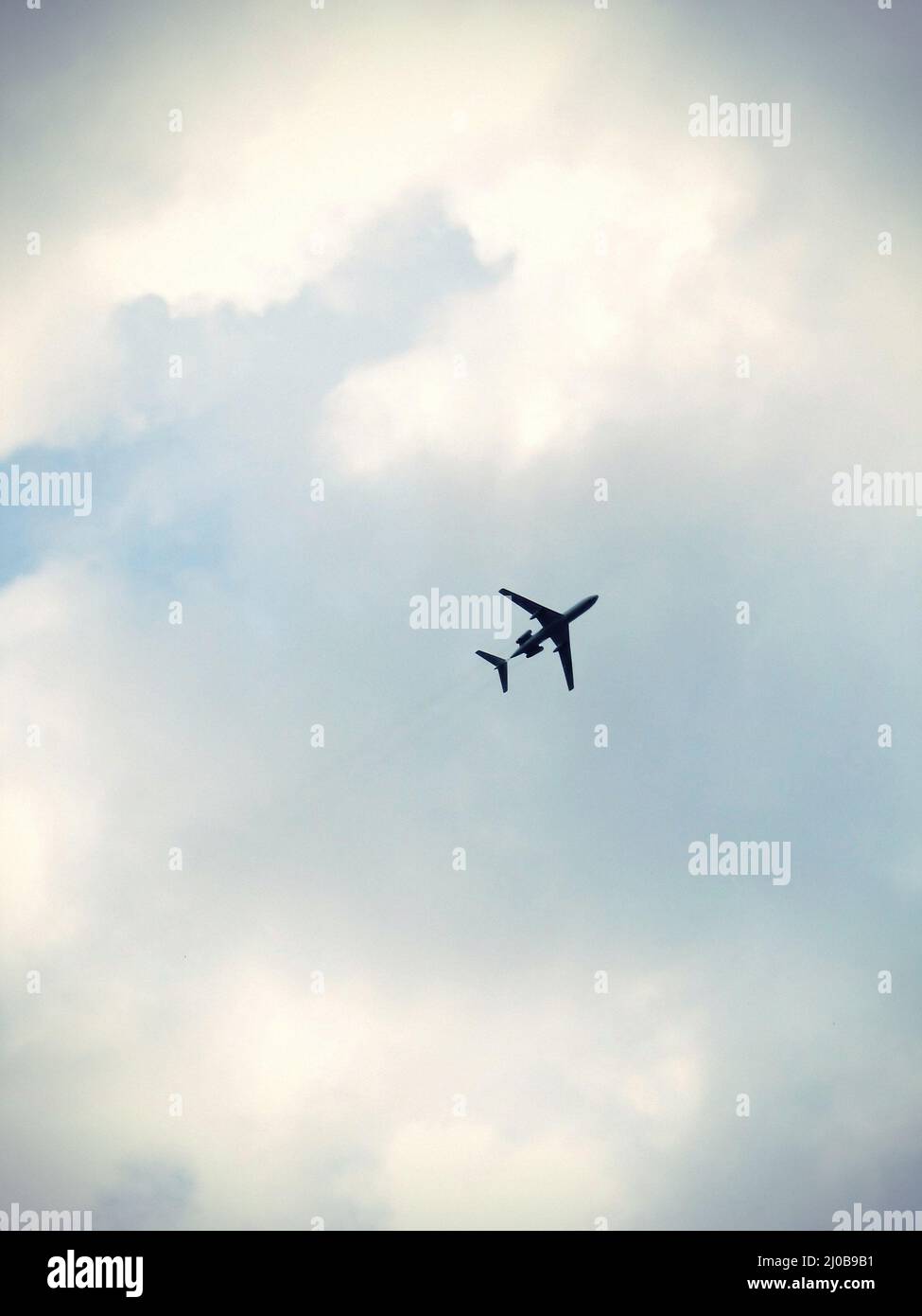 Plane flying into weather hi-res stock photography and images - Alamy