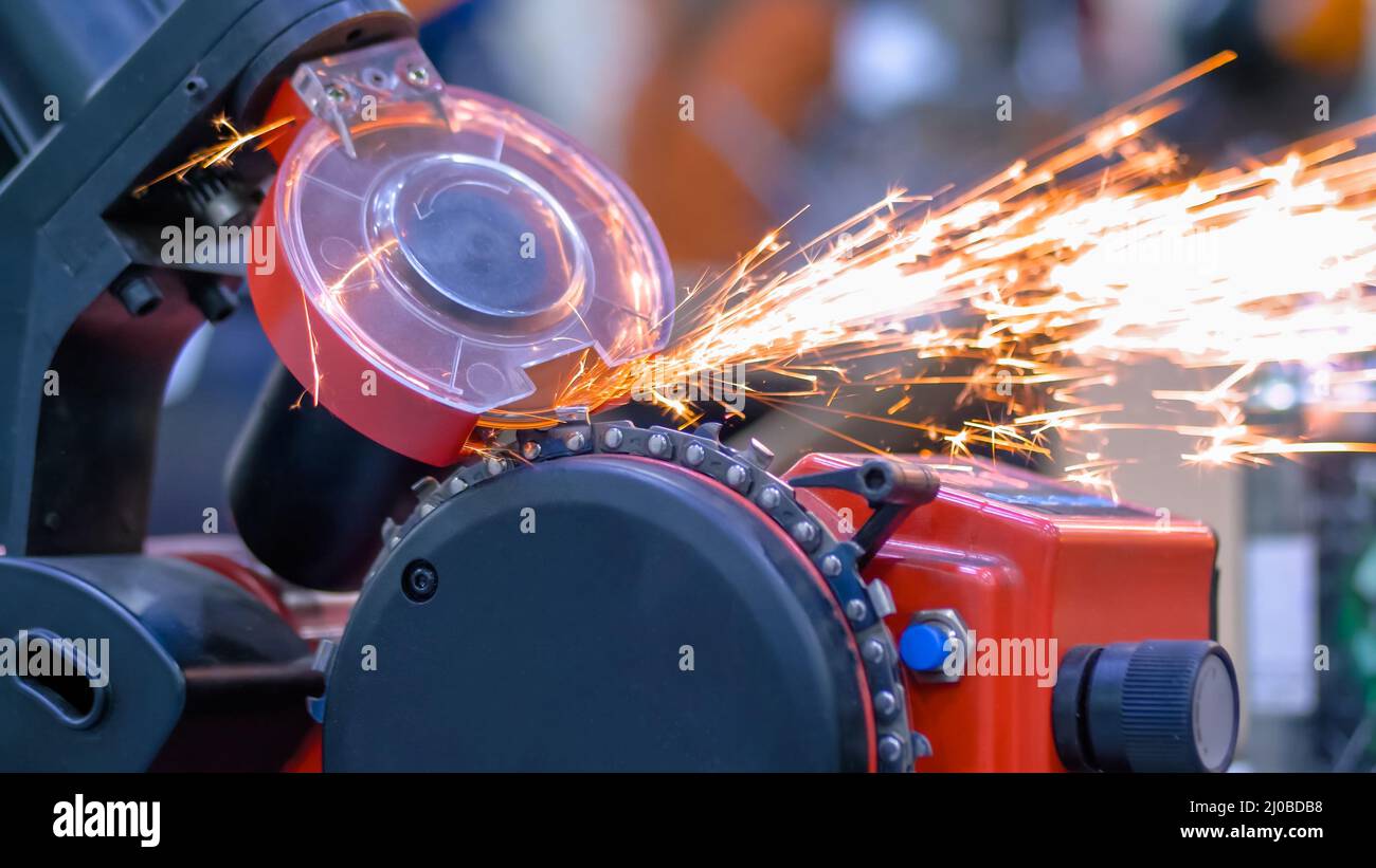 Automatic saw chain sharpening machine during work at close