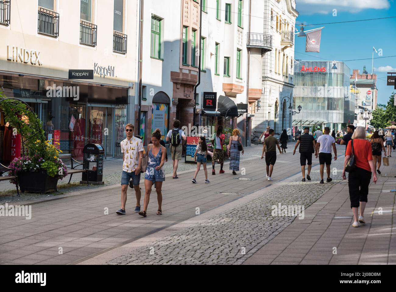 Uppsala, Uppland  Sweden - 07 27 2019- People of mixed ages and gender walking through the shopping streets of the city center Stock Photo