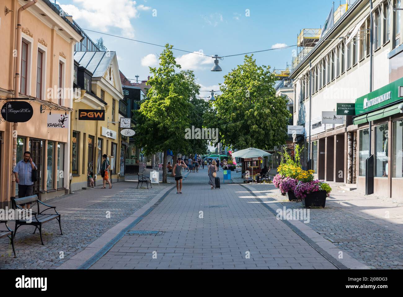 Uppsala, Uppland  Sweden - 07 27 2019- People of mixed ages and gender walking through the shopping streets of the city center Stock Photo