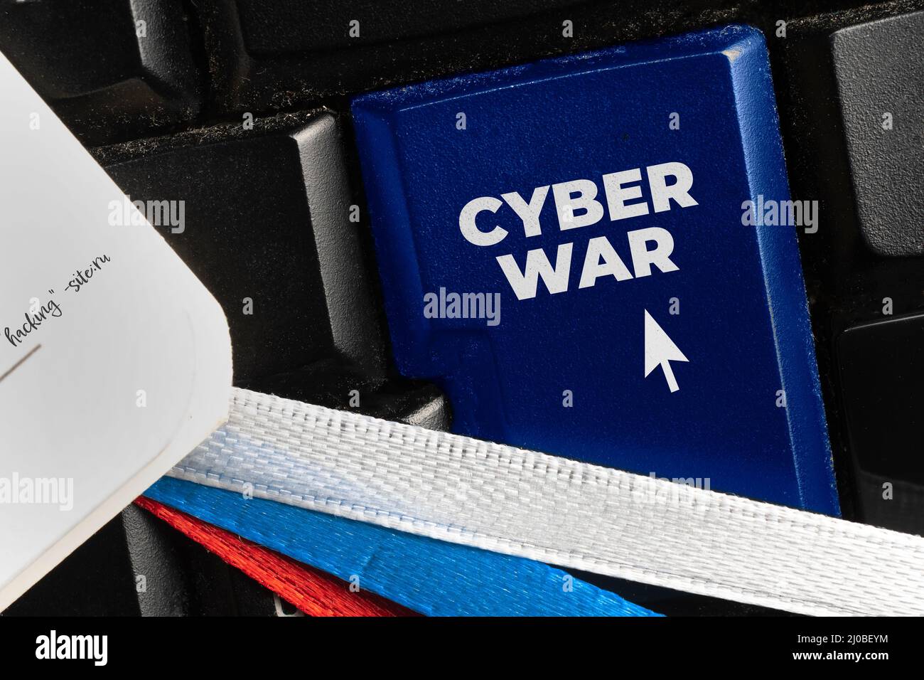 Cyber war concept: black computer keyboard with text Cyber Attack Stock Photo