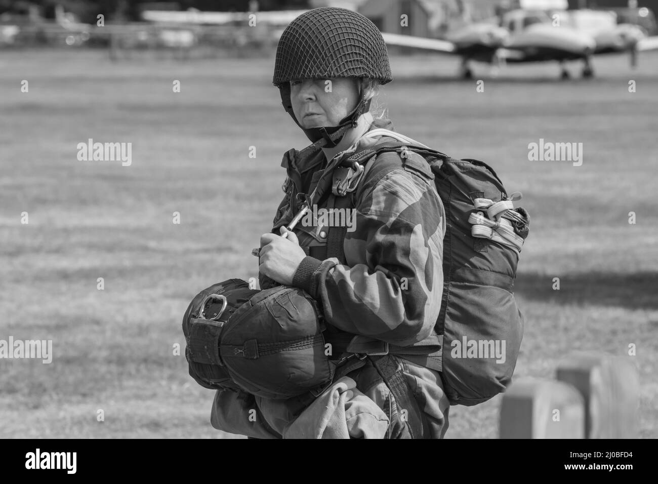 Headcorn, Kent  UK - July 1st 2018   World War II paratrooper drop re-enactment. Black and white editorial image of soldiers preparing to board the C- Stock Photo