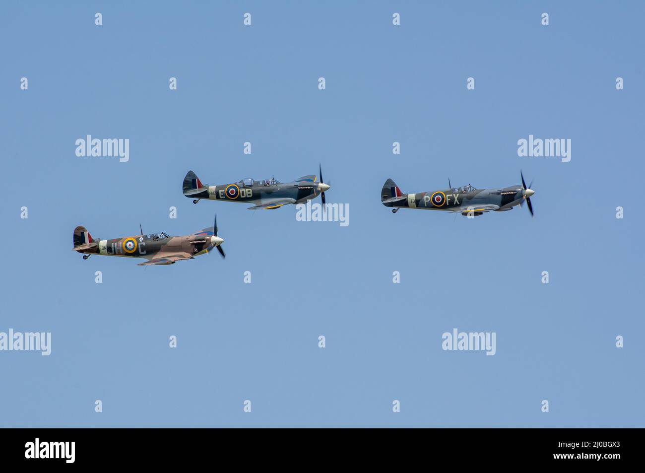 Headcorn, Kent  UK - July 1st 2018 A formation group of three spitfire WW2 fighter planes fly in airshow over Kent. Stock Photo
