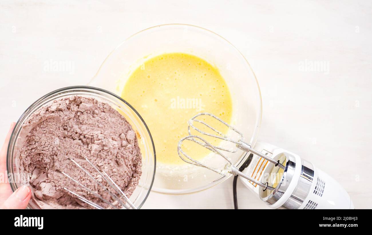 Step by step. Flat lay. Mixing ingredients in a glass mixing bowl to