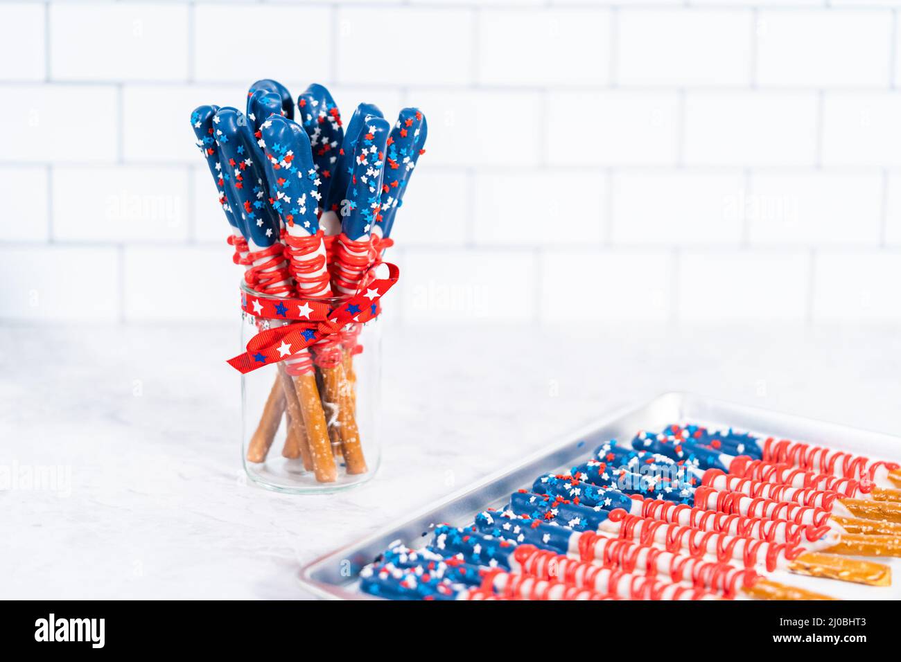 Homemade chocolatecovered pretzel rods decorated like the American