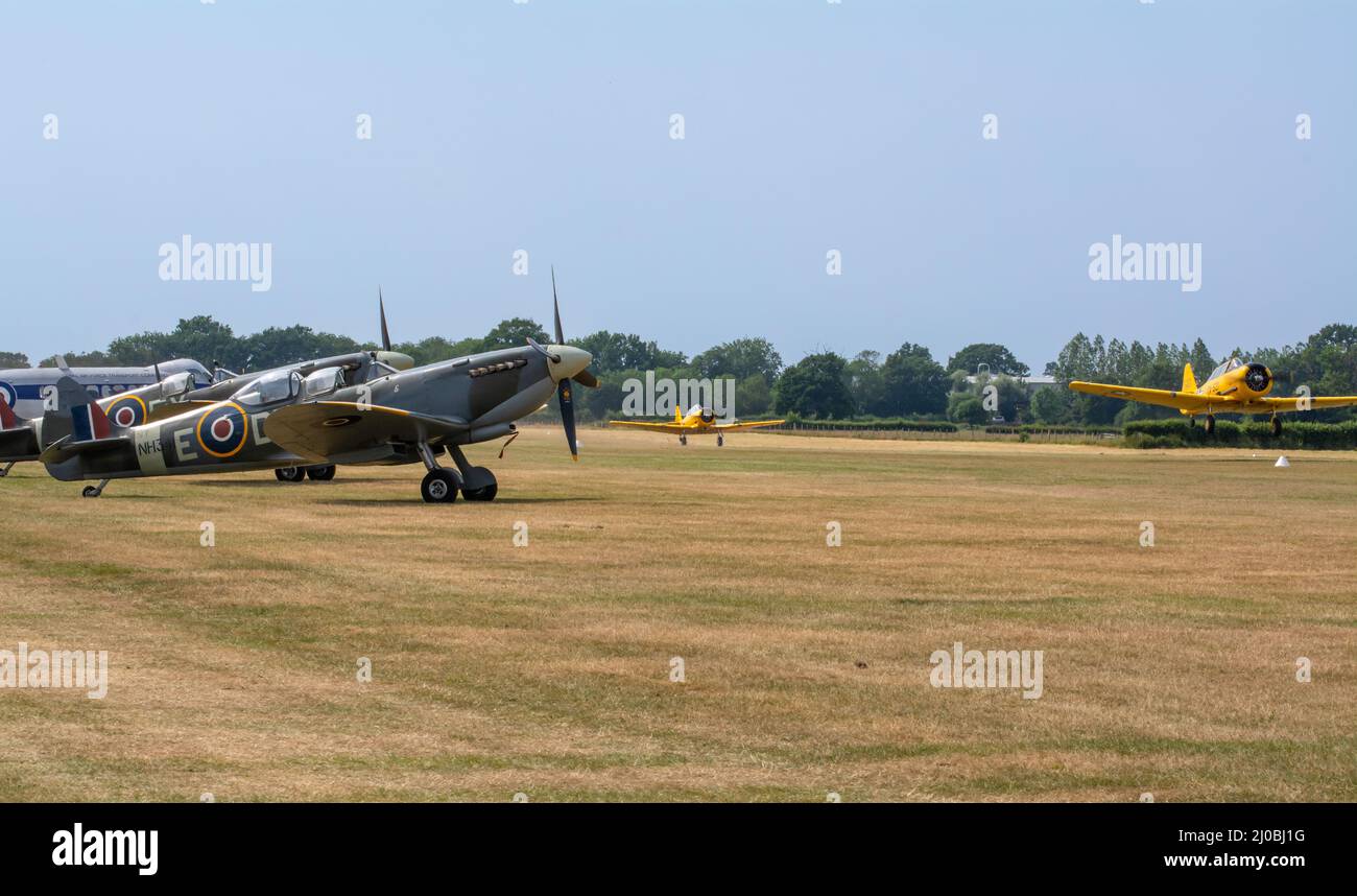 Headcorn, Kent  UK - July 1st 2018   A T6 texan taking off and then doing a flyby manoeuvre during a flight of vintage flights. Seen in flight with a Stock Photo