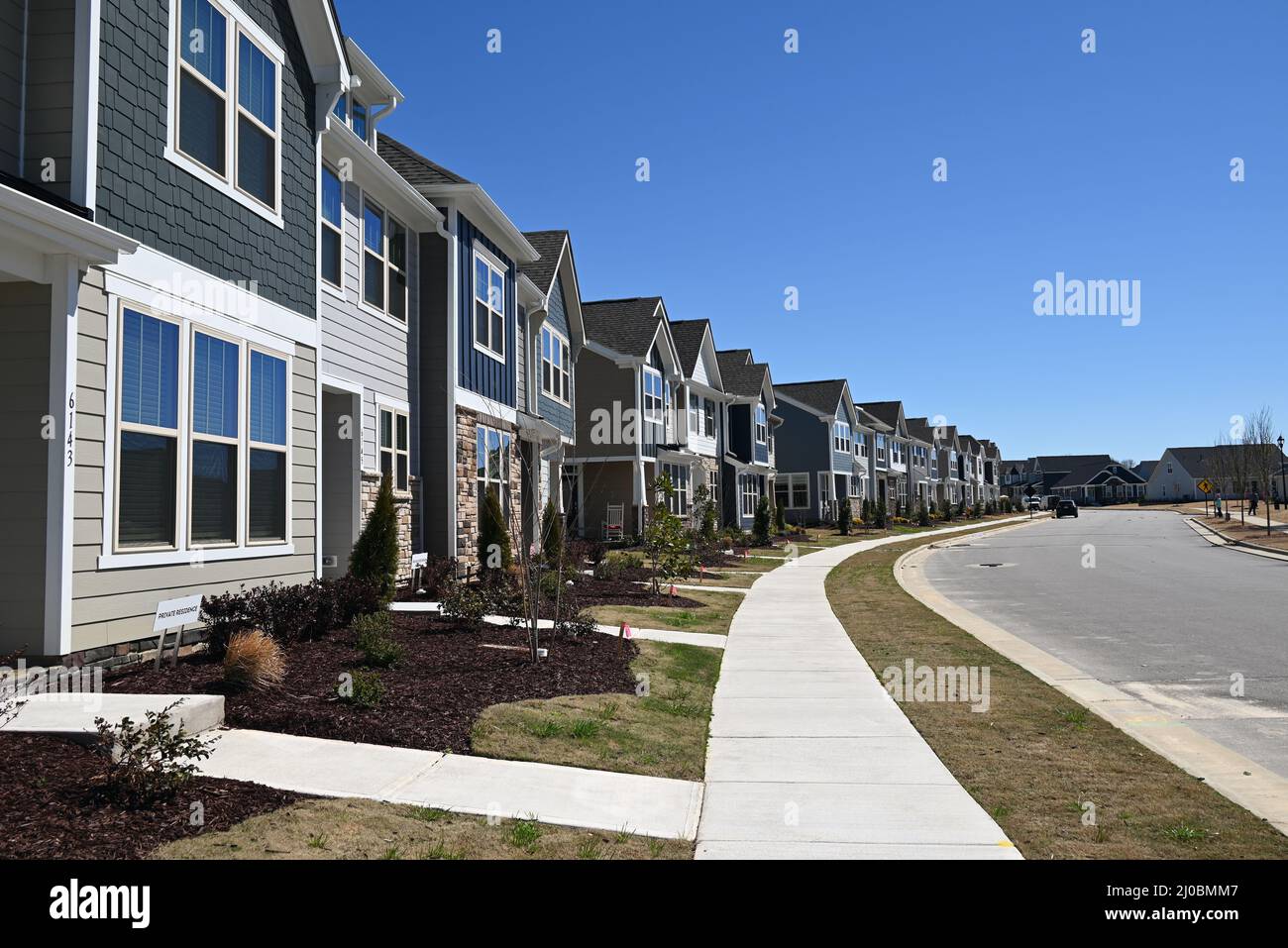New tract homes stretch off into the distance in a planned community outside of Raleigh, North Carolina Stock Photo