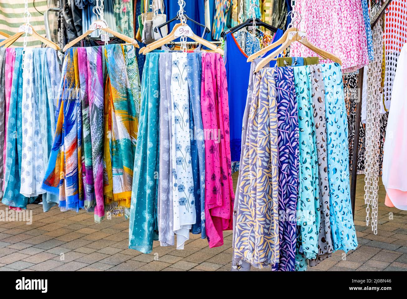 Epsom Surrey London UK, March 17 2022, Market Stall Selling Fashionable Colourful Womens Clothing Stock Photo