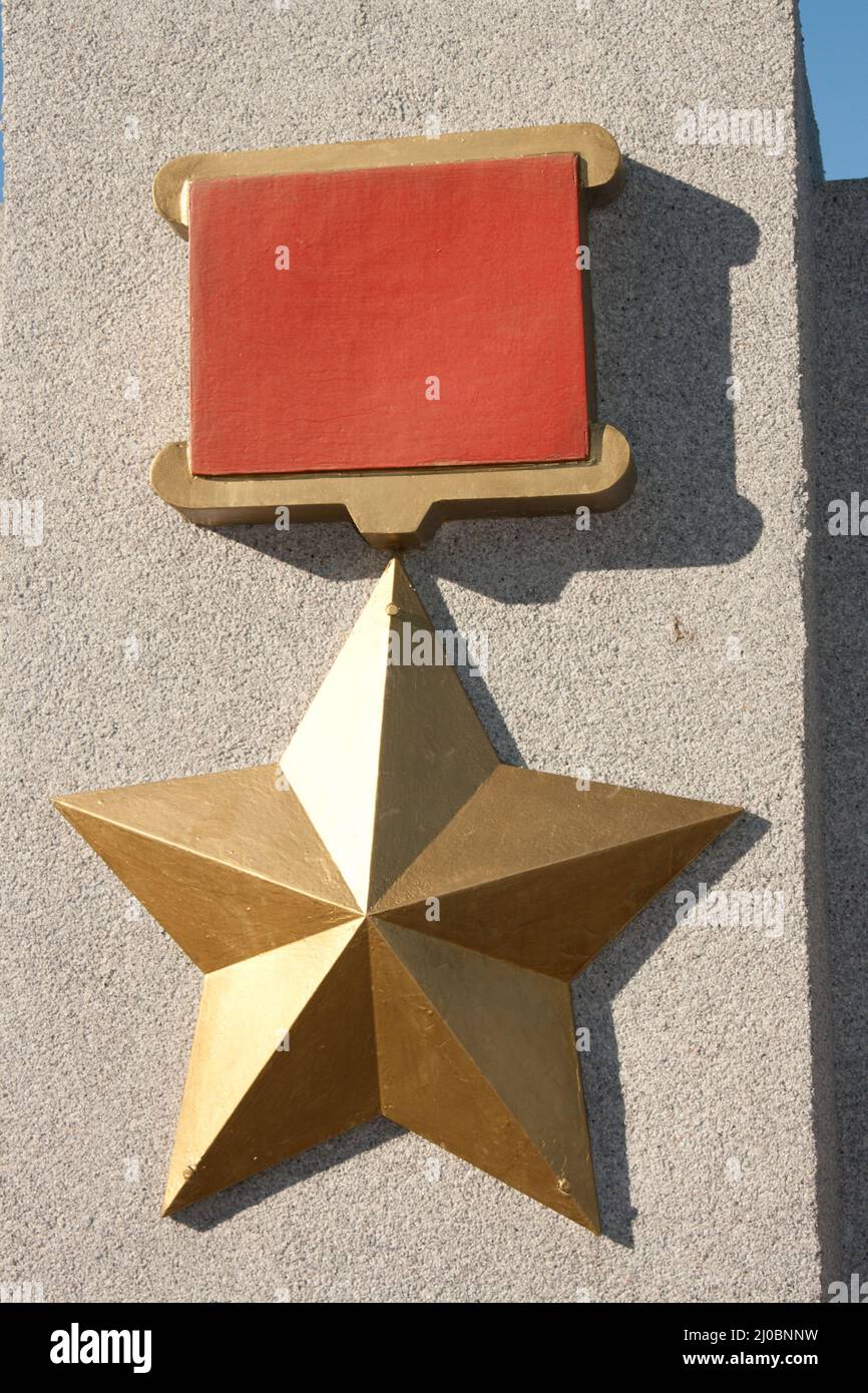 Medal Gold Star Hero of the Soviet Union on a pedestal in Petrozavodsk, Russia Stock Photo