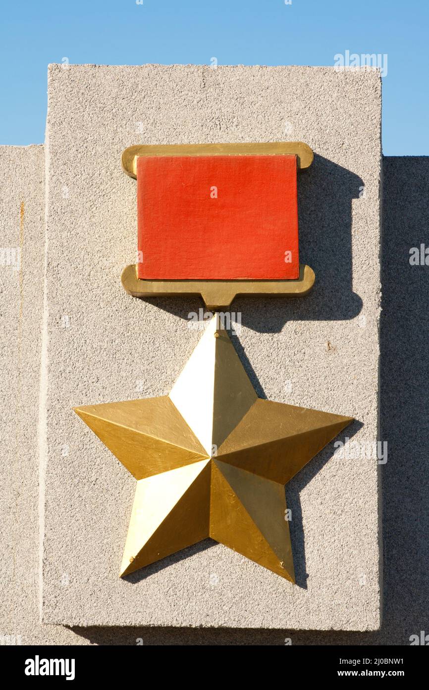 Medal Gold Star Hero of the Soviet Union on a pedestal in Petrozavodsk, Russia Stock Photo