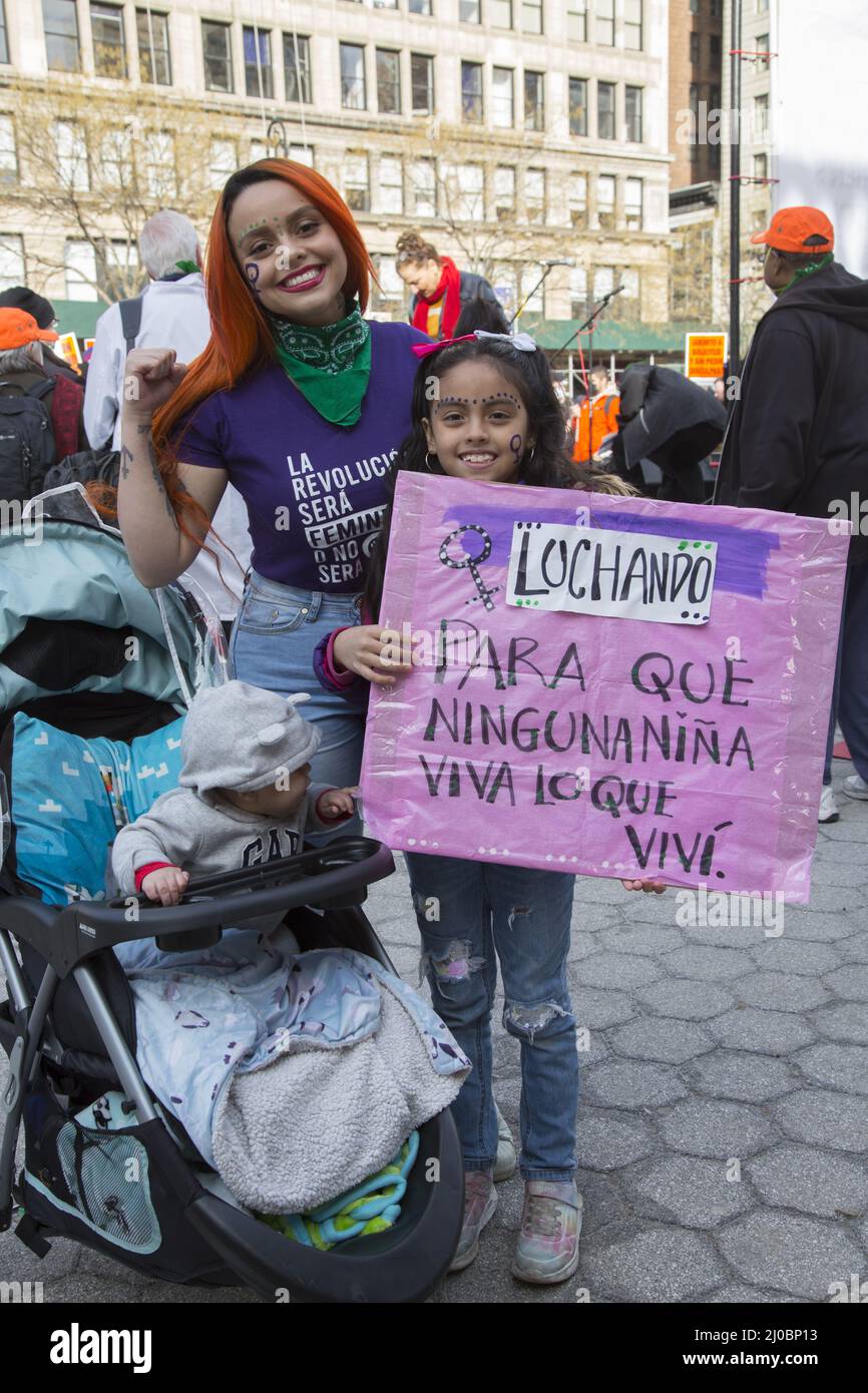 Women and men gather on International Women's Day at Union Square to protest, Rally and march against the widespread attack on a woman's right to abortion in the United States blocking control over ones own body. New York City. Stock Photo