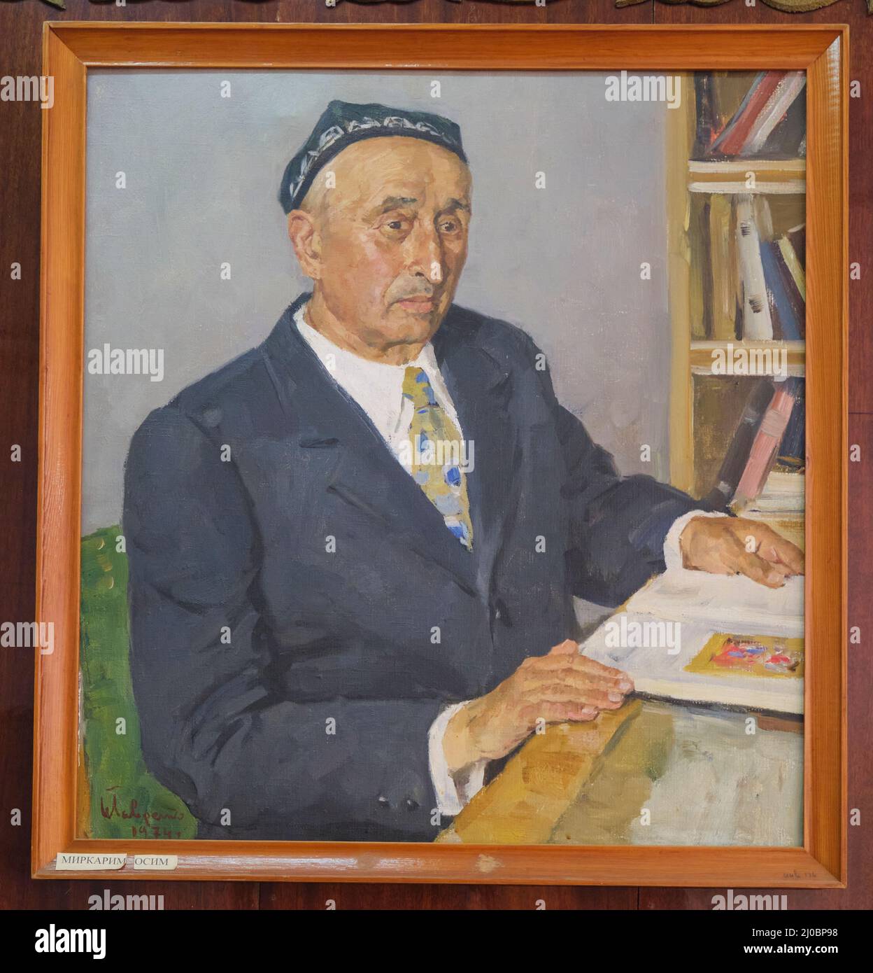 A portrait, picture of the famous Uzbek writer, Mirkarim Osim. Painting by the artist I Lavrenko. At the Alisher Navoi State Museum of Literature in T Stock Photo