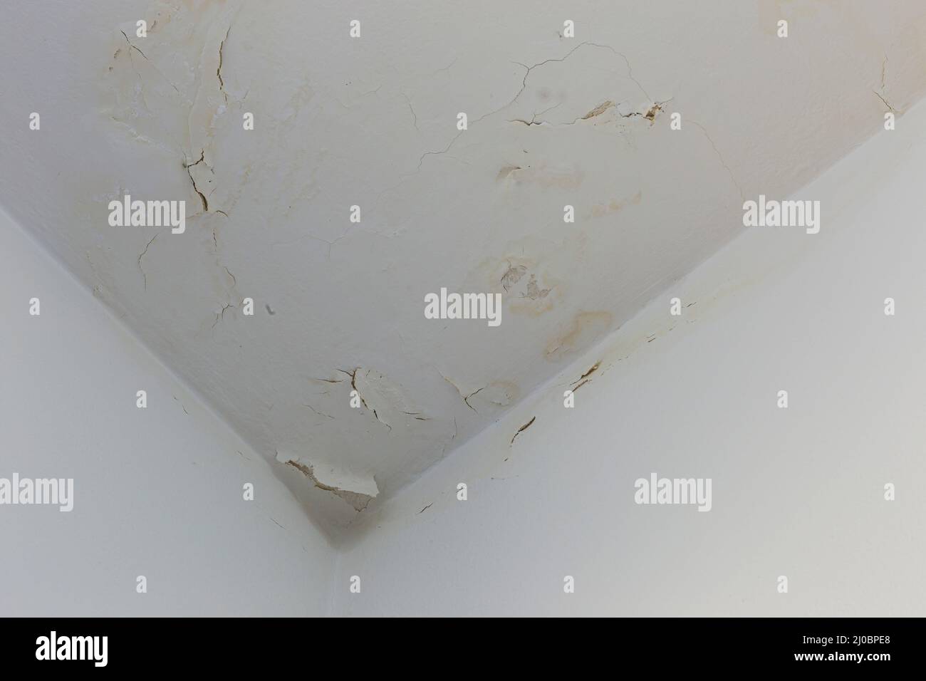 Ceiling With Peeling Paint, Water Infiltration Stock Photo