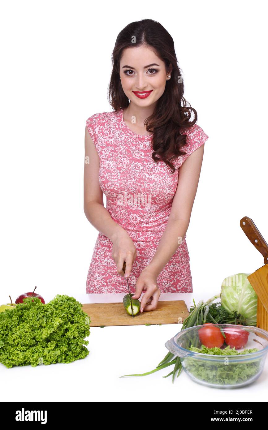 Woman cutting vegetables in the kitchen. Cooking healthy diet food concept  Stock Photo - Alamy