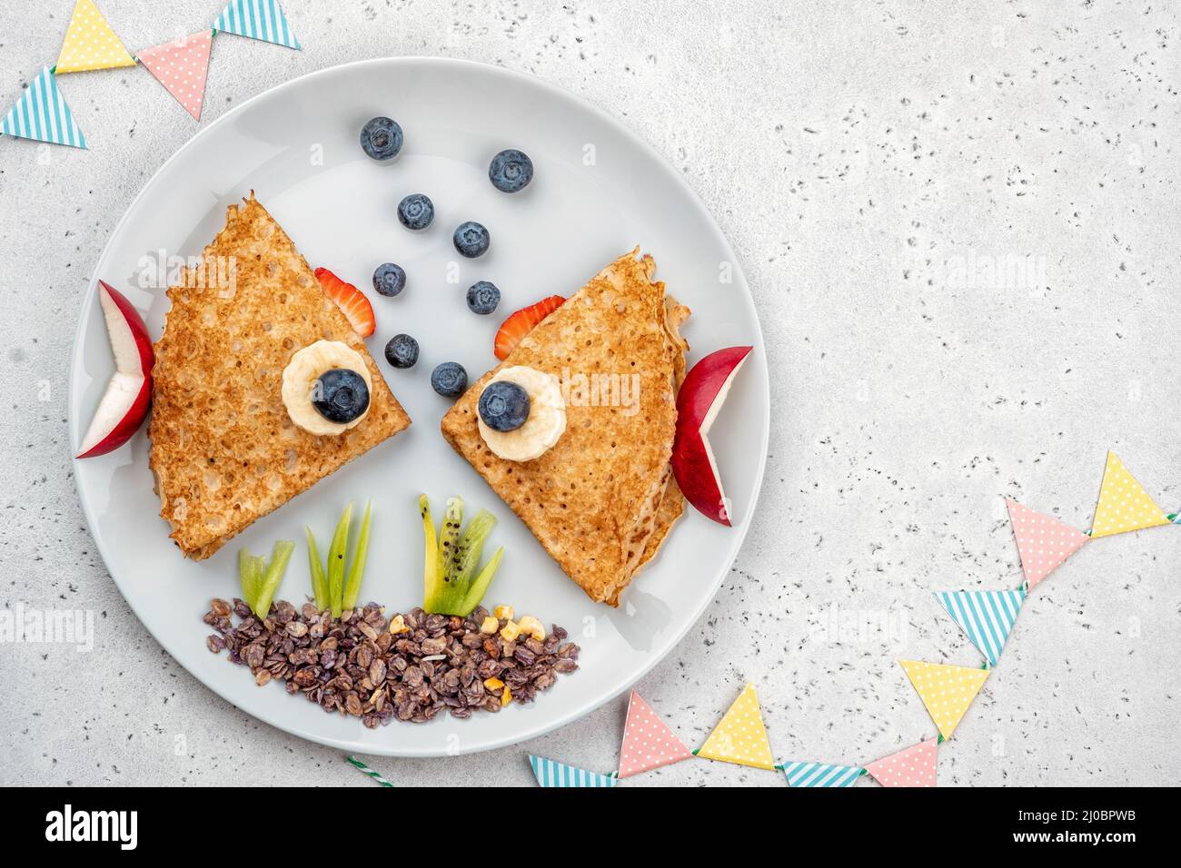 Crepes pancakes looks like a fish Stock Photo Alamy