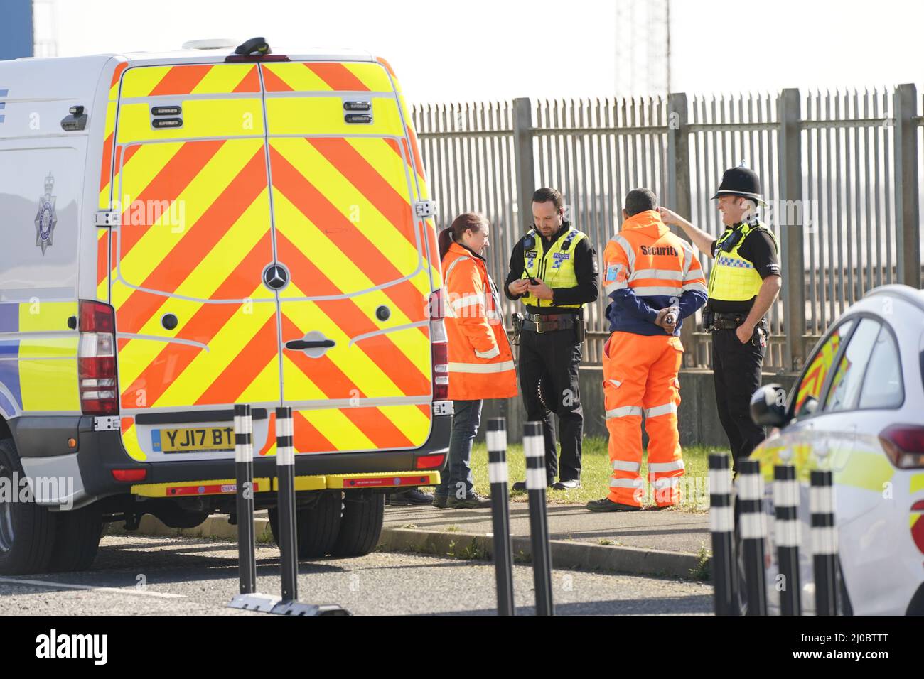 Police officers and security at an entrance to the Port of Hull, East