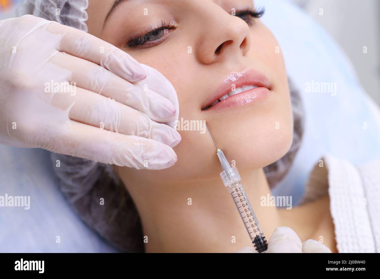 Rejuvenating facial injections. Stock Photo