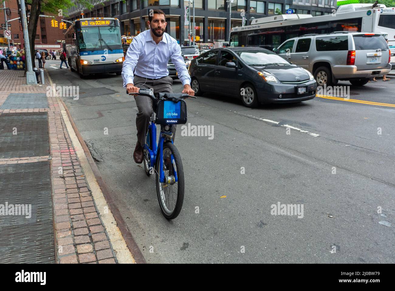 New York City, NY, USA, Business Man Bicycling to Work on Street in