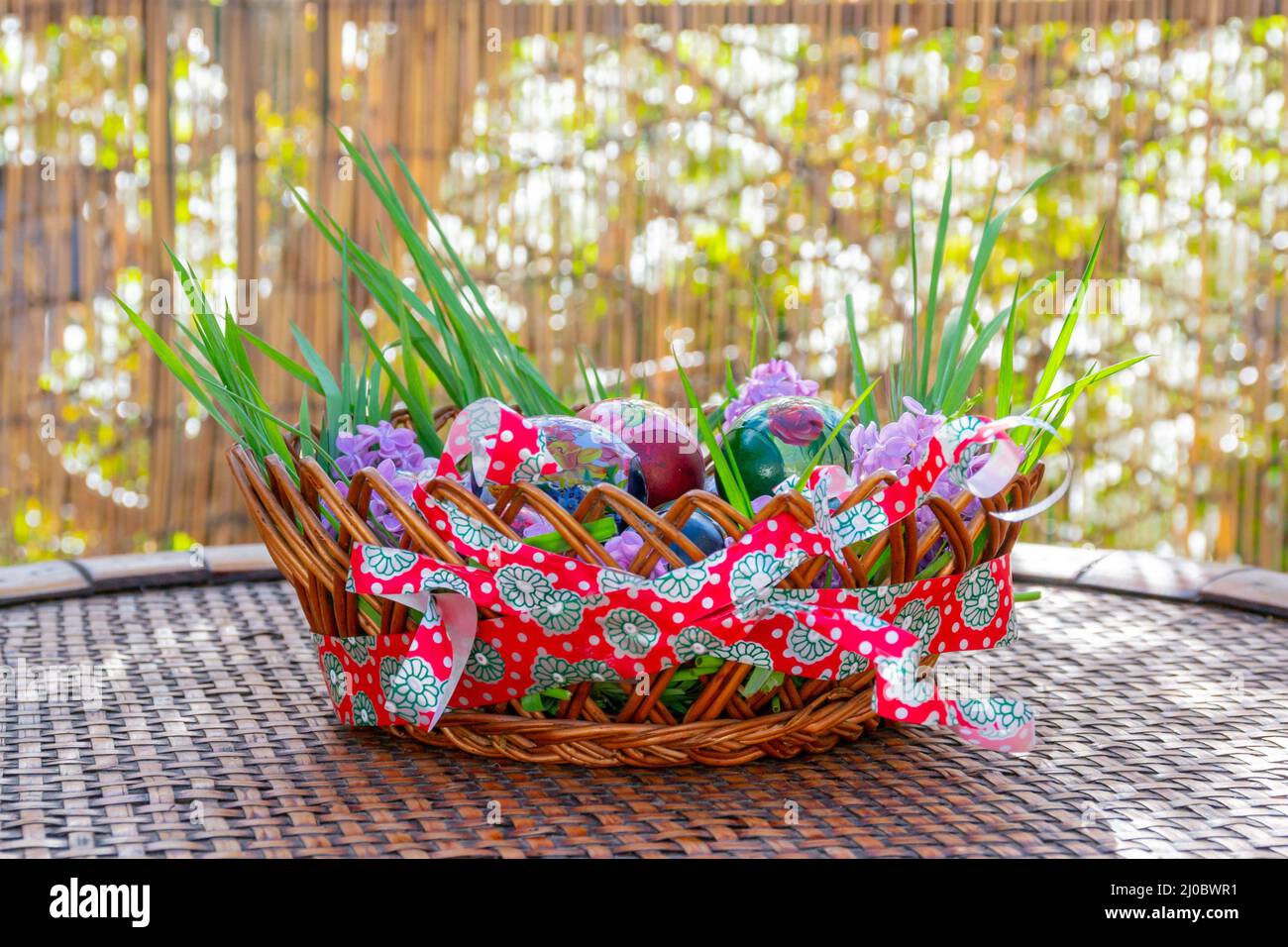 Easter basket decoration on wood Stock Photo