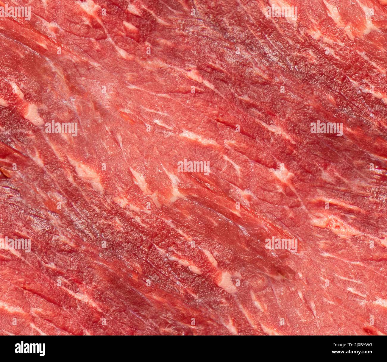 Seamless fresh meat background. Raw uncooked red beef meat texture