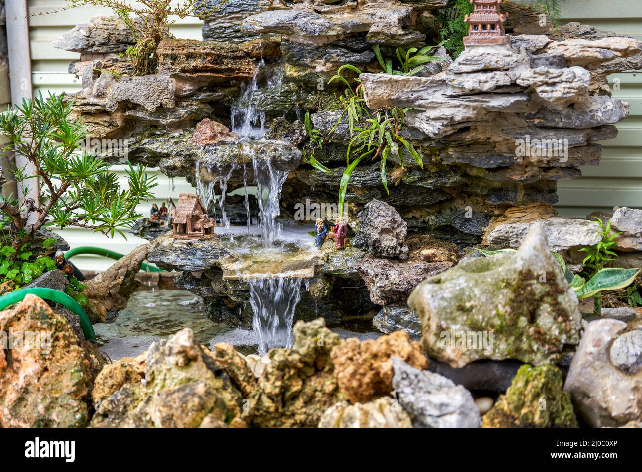 Stream in garden rockery hi-res stock photography and images - Alamy