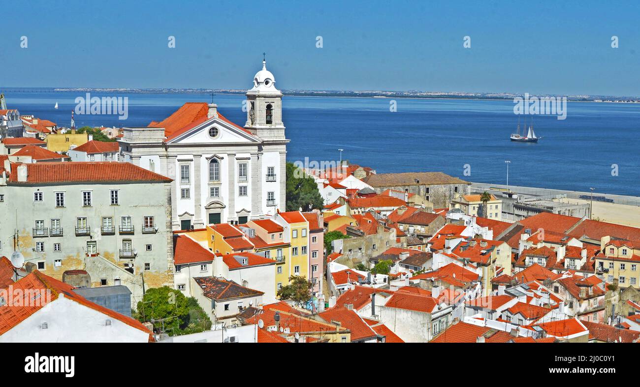 aerial view on Tagus river and Santo Estevao church from Miradouro de Santa Luzia, Lisbon, Portugal Stock Photo