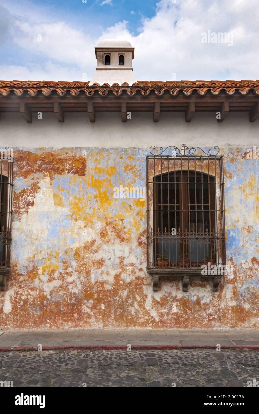 Colonial style house facade in the city of La Antigua Guatemala. Stock Photo