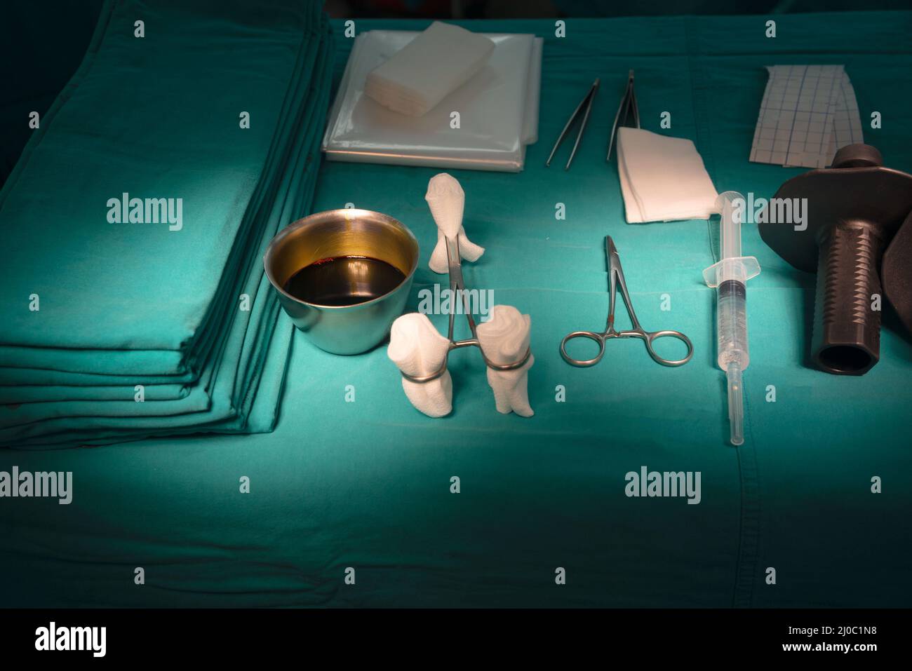 Surgical instruments on green table in operating room Stock Photo Alamy
