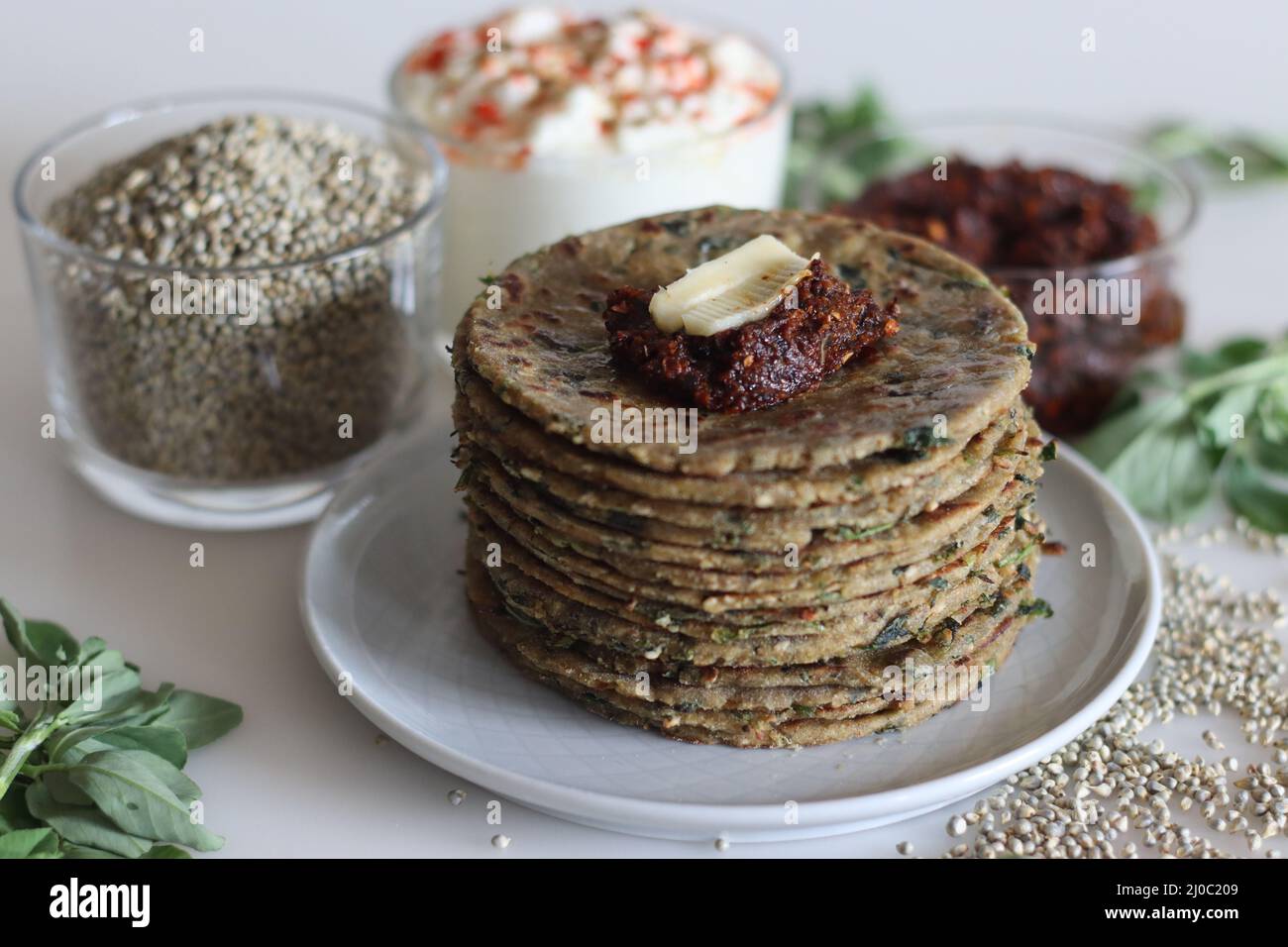 Bajra methi thepla. Indian flat bread made of pearl millet flour, fenugreek leaves, sesame seeds