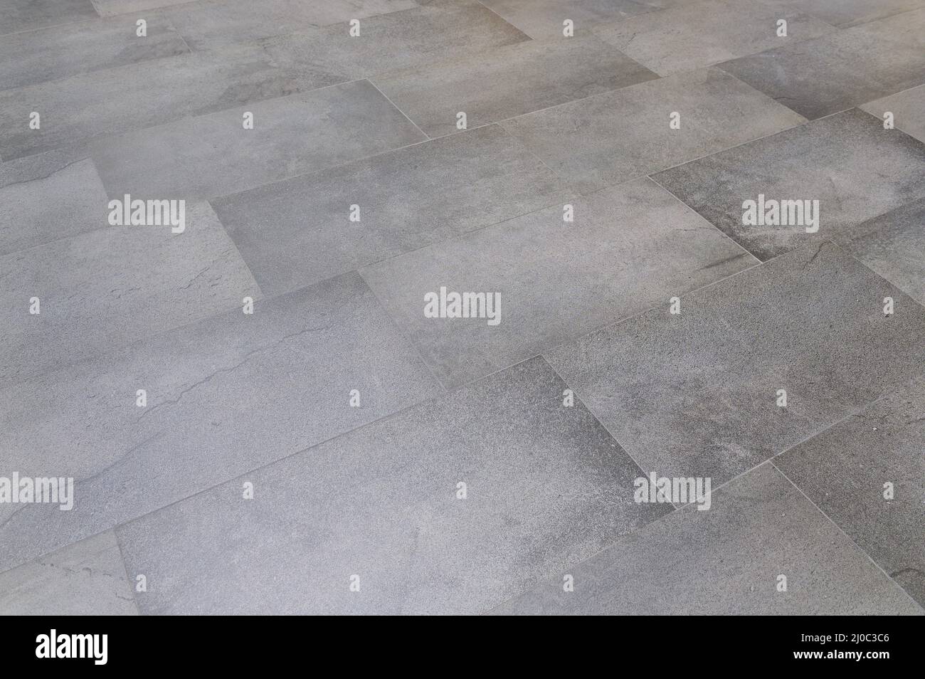Perspective view of grey tile floor Stock Photo