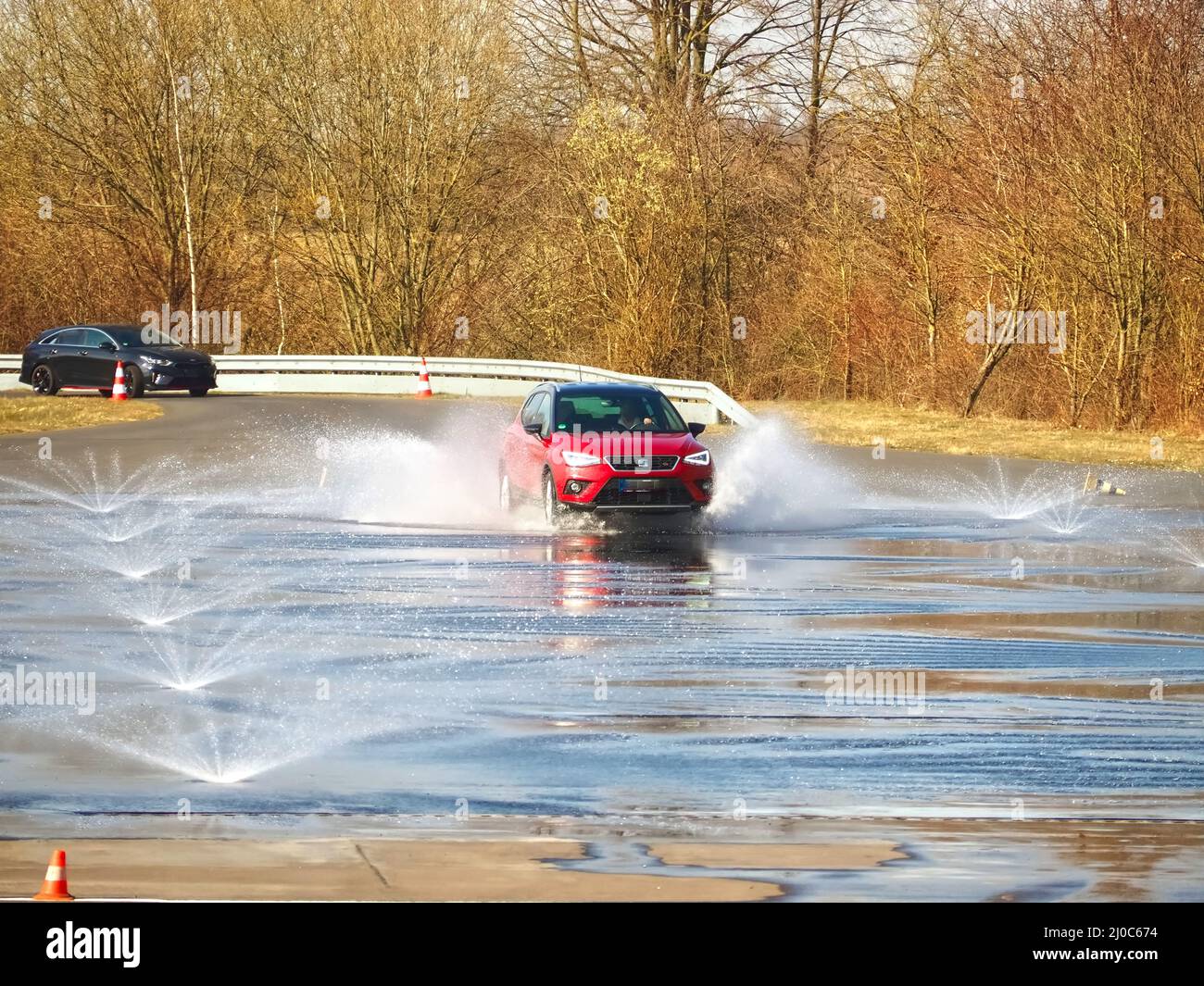 ADAC driving safety training aquaplaning on a practice area Stock Photo